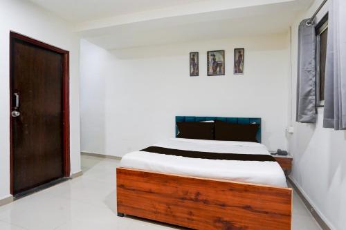 Ένα ή περισσότερα κρεβάτια σε δωμάτιο στο Hotel O Pearl Inn Executive