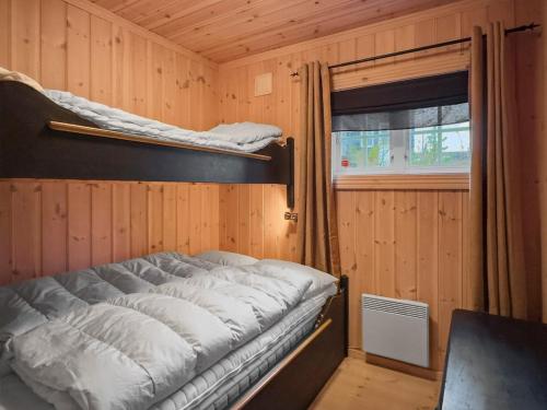 Postel nebo postele na pokoji v ubytování Mountain cabin in Aurdal Fireplace Sauna 1000 meters above sea level