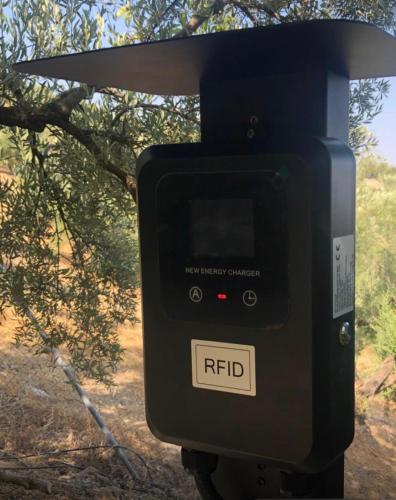 a rtd camera on a stand in front of a tree at Cabañas De Madera Y Bungalows - Gilmañas 3 in La Iruela