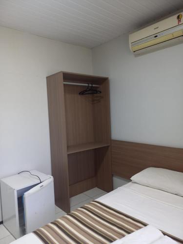 Una cama o camas en una habitación de Pousada Lagoa Seca