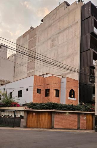 a building in front of a building at Haku Hostel in Lima