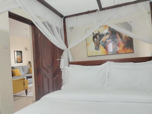 Ένα ή περισσότερα κρεβάτια σε δωμάτιο στο Lakeview Apartments - Serene Mustard