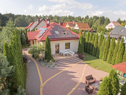 Dom Buczki - całoroczny dom z jacuzzi i ogrodem nad jeziorem Selmęt Wielki