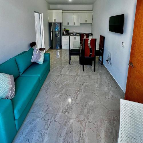 TV a/nebo společenská místnost v ubytování habitacion a 100 pasos de la playa