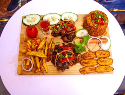 a tray of food on a white table at Ontario Suites in Lagos