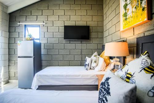 Ένα ή περισσότερα κρεβάτια σε δωμάτιο στο Dolphin Coast Stay