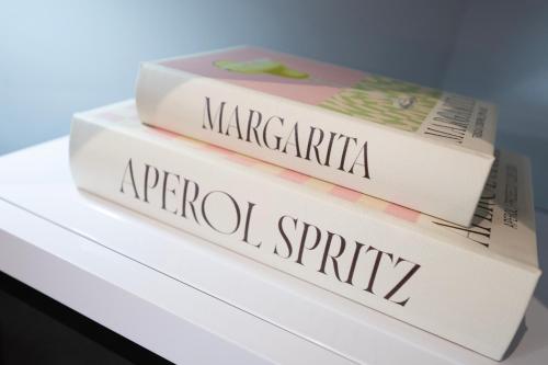 three books stacked on top of each other at 1BR - Stunning 5th-Flr Views - Sleeps 4 - Parking in Hoo