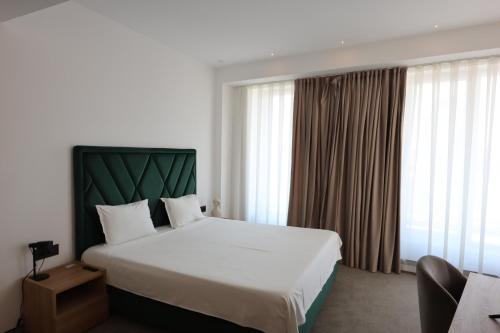 Postel nebo postele na pokoji v ubytování CM111Apparthotel