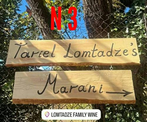 a sign that reads rentedyards marland attached to a tree at Lomtadze Family Wine Hotel in Ambrolauri