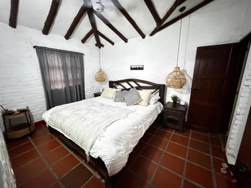 Una cama o camas en una habitación de Beautiful House in the Mountains
