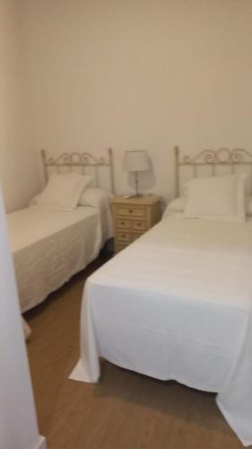 Ένα ή περισσότερα κρεβάτια σε δωμάτιο στο Casa Lucero