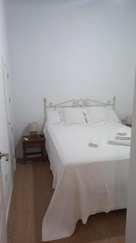 Ένα ή περισσότερα κρεβάτια σε δωμάτιο στο Casa Lucero