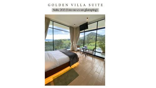 a bedroom with a bed and a large window at Golden Glamping & Suites in Guatavita
