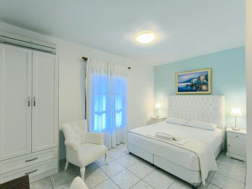 Кровать или кровати в номере Anna Maria - Vanessa Apartments
