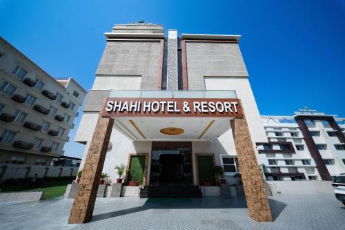 a building with a sign that reads shah hotel and resort at The Sky Imperial - Shahi Hotels & Resort in Nāthdwāra