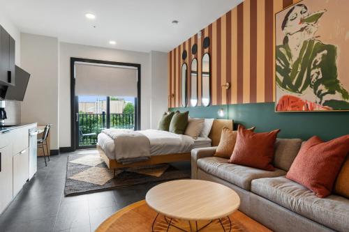a living room with a couch and a table at The Soundry in Nashville