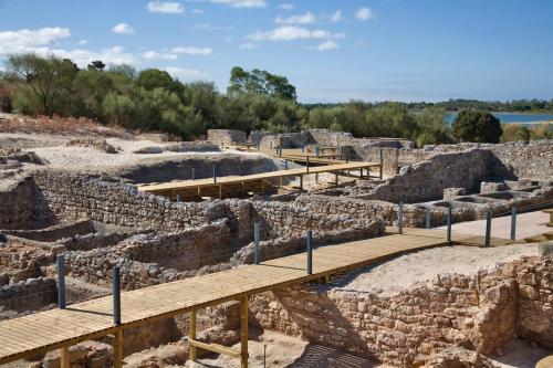 an amphitheater under construction with a wooden walkway at Tróia Resort - Paradise in Troia