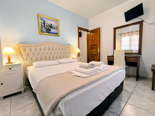 Кровать или кровати в номере Anna Maria - Vanessa Apartments