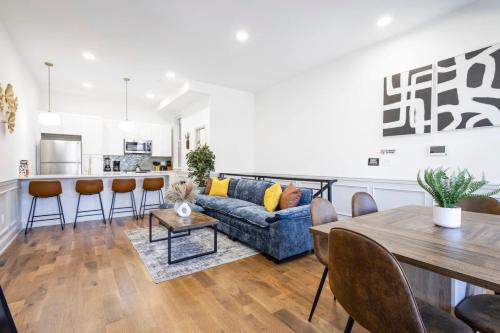 a living room with a couch and a table at 2BR w Balcony - Fairmount Park - 10 mins to DT in Philadelphia