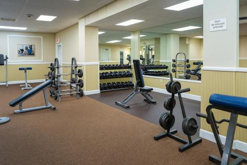 a gym with several rows of weight machines at Players Club Resort in Hilton Head Island