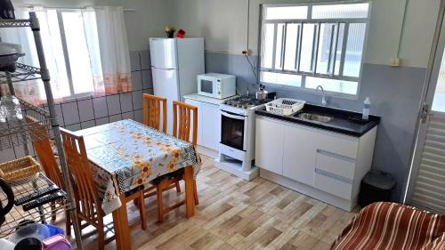 Kuchyň nebo kuchyňský kout v ubytování Residencial Praia da Daniela