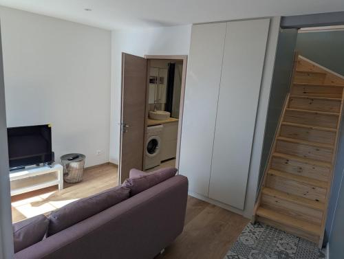 Televisyen dan/atau pusat hiburan di Le Triplex maison de ville rénovée