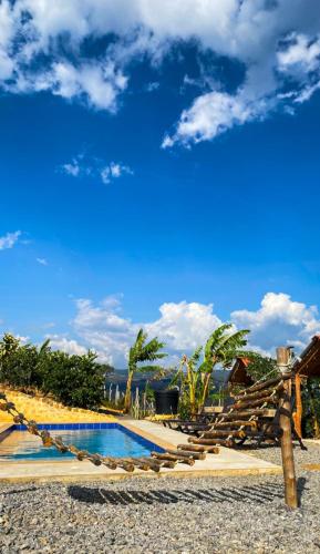 Bazén v ubytování Gran Vista Glamping Curití nebo v jeho okolí