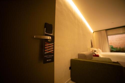 Una cama o camas en una habitación de Gres apartamentos