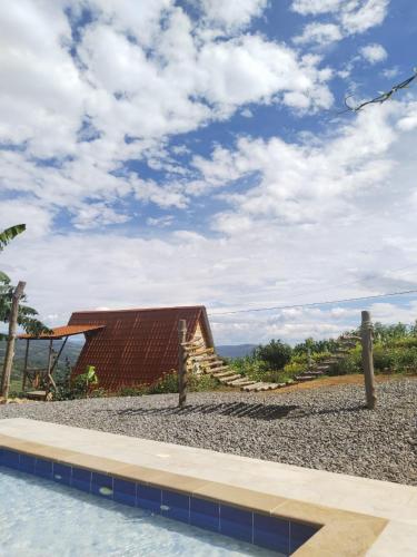 Bazén v ubytování Gran Vista Glamping Curití nebo v jeho okolí