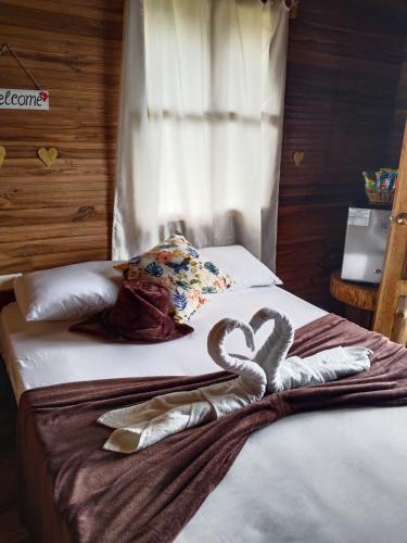Postel nebo postele na pokoji v ubytování Gran Vista Glamping Curití