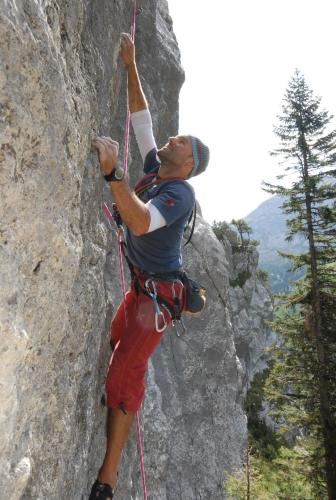 a man is climbing on a rock wall at Landhaus Alpbach in Alpbach