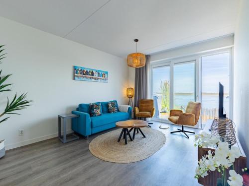 Posezení v ubytování Apartment in Sint-Annaland by Oosterschelde