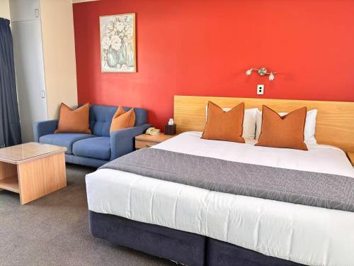 Postel nebo postele na pokoji v ubytování Arcadia Motel