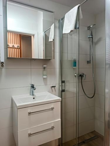 Ένα μπάνιο στο AmaMolto Select - włoskie apartamenty, bezpłatny parking