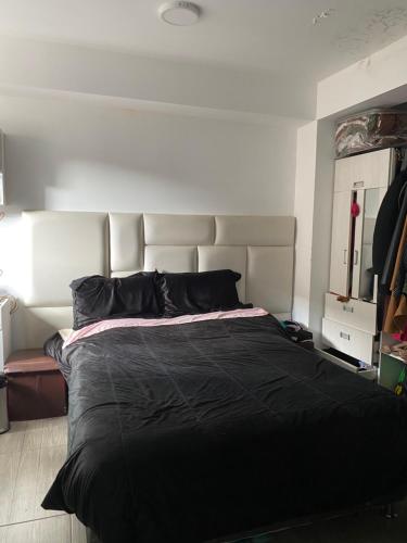 Ένα ή περισσότερα κρεβάτια σε δωμάτιο στο Ortiz House