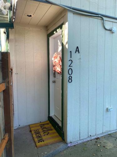 an open door of a building with a door sidx sidx at Near Downtown- Kitchen-washerdryer-parking in Medford