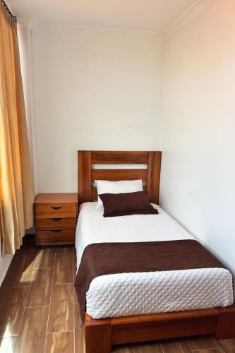 Letto o letti in una camera di Hotel Quitus Airport