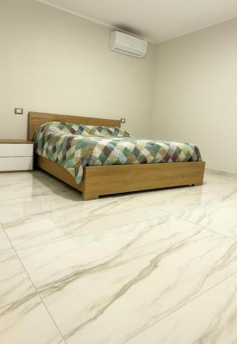 Postel nebo postele na pokoji v ubytování Giulius Luxury Home