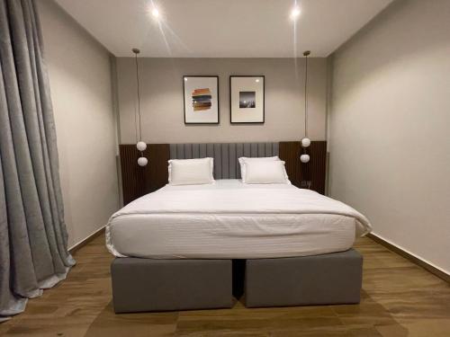 Ένα ή περισσότερα κρεβάτια σε δωμάτιο στο CheckInn Hotel Yola