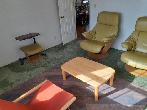 Posezení v ubytování ゲストハウス苫小牧 2部屋 5名迄
