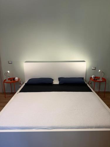 Postel nebo postele na pokoji v ubytování Casa Tuxedo