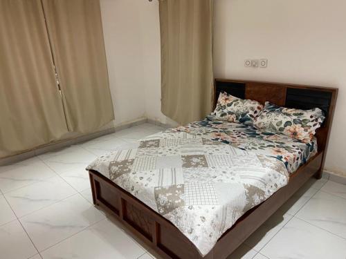 Ένα ή περισσότερα κρεβάτια σε δωμάτιο στο 3BR Ultra Modern House in Gbawe