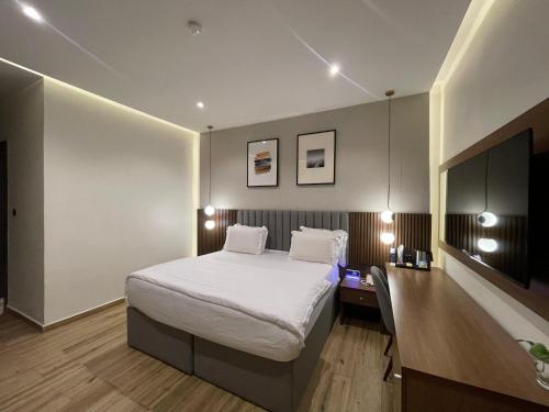 Ένα ή περισσότερα κρεβάτια σε δωμάτιο στο CheckInn Hotel Yola