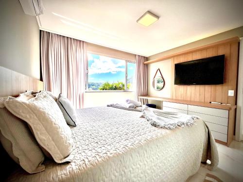 Postel nebo postele na pokoji v ubytování Apê das Montanhas com vista e próx centro DM