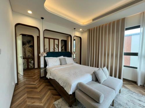 Ein Bett oder Betten in einem Zimmer der Unterkunft Tropical Villa Ho Tram