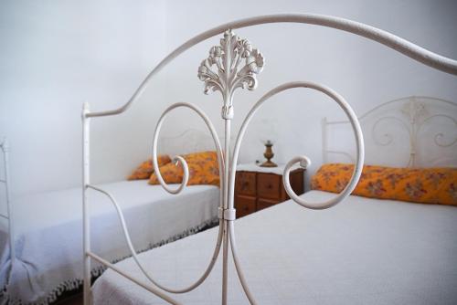 Ένα ή περισσότερα κρεβάτια σε δωμάτιο στο Casa Mira