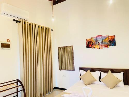 Ένα ή περισσότερα κρεβάτια σε δωμάτιο στο Villa Three Double One