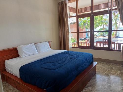 Postel nebo postele na pokoji v ubytování Tiger Hut