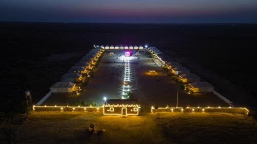 an aerial view of a beach at night at Desert Island Camp & Resort Jaisalmer in Jaisalmer