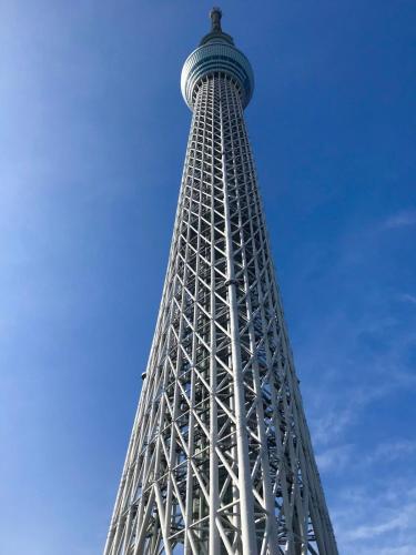 a view of the eiffel tower against a blue sky at 4mins from sky tree Sumida area 3rooms Wifi in Tokyo